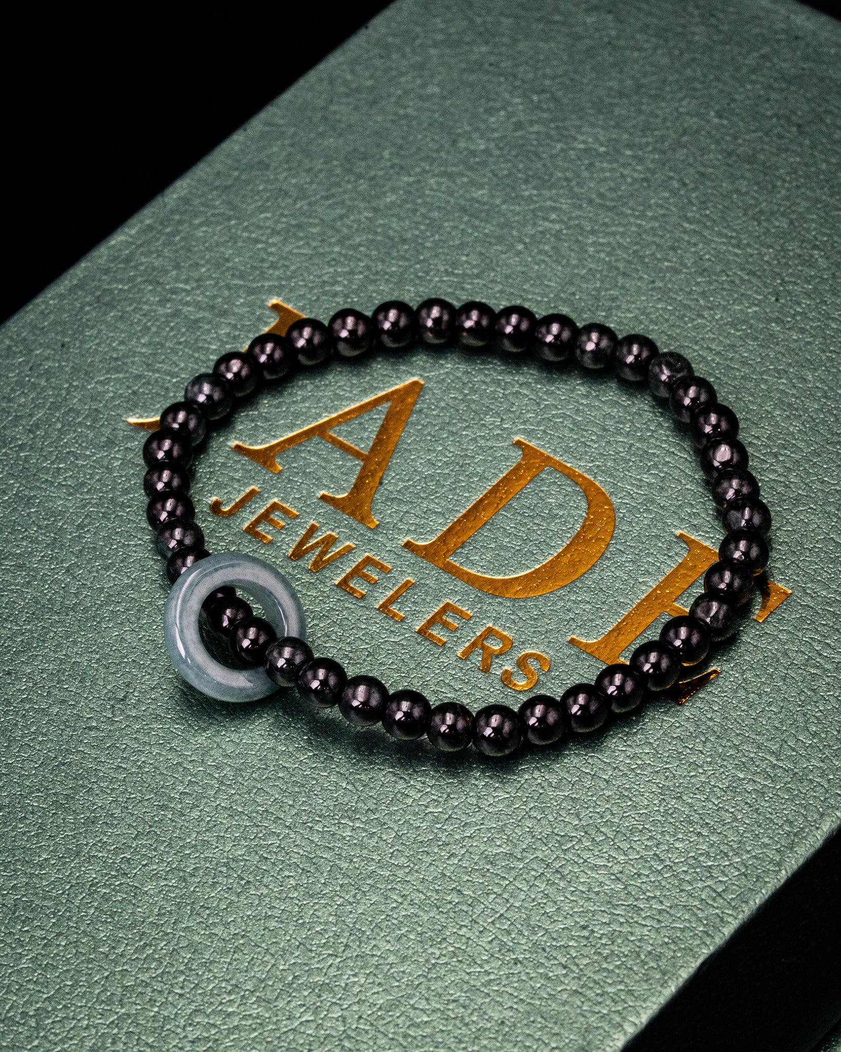 Blue Donut Charm Black Beaded Jade Bracelet - Image 2