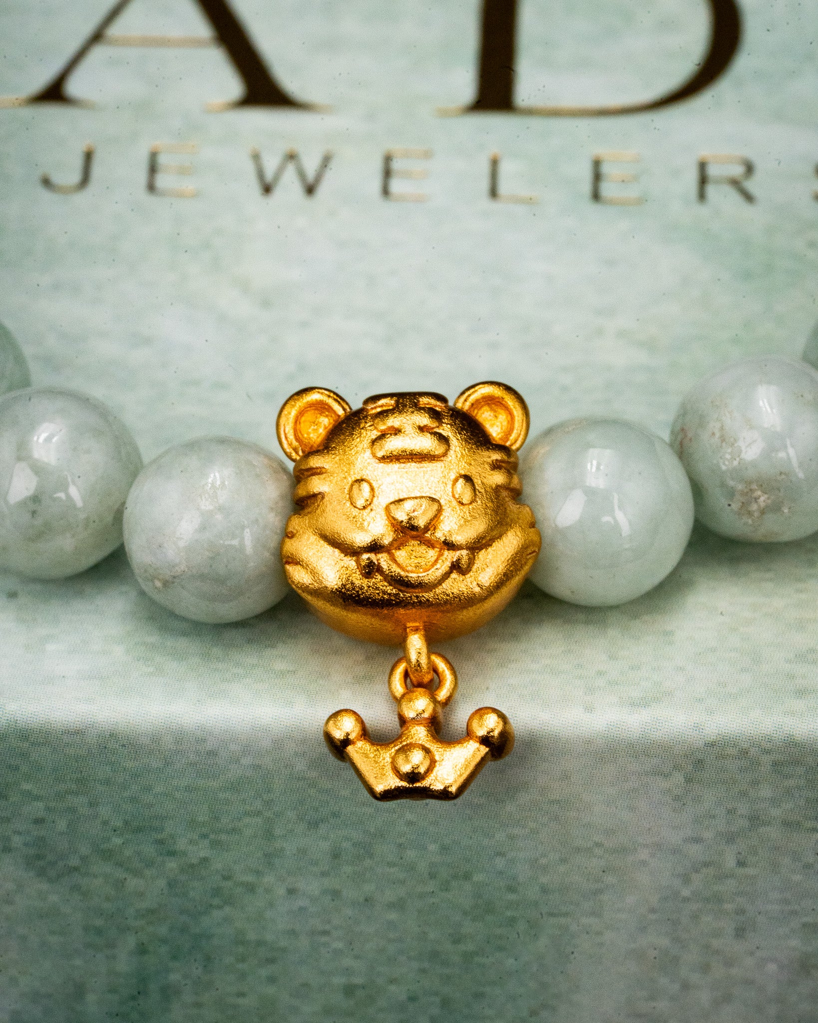 Gold Tiger Charm White Beaded Jade Bracelet
