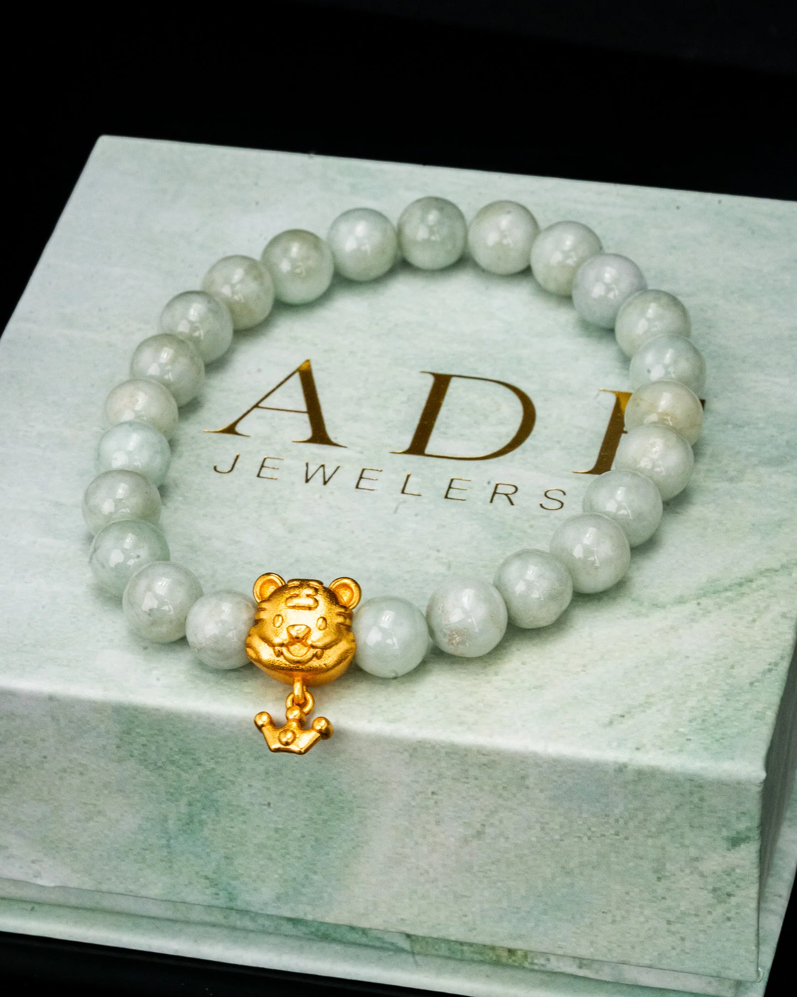 Gold Tiger Charm White Beaded Jade Bracelet - Image 2